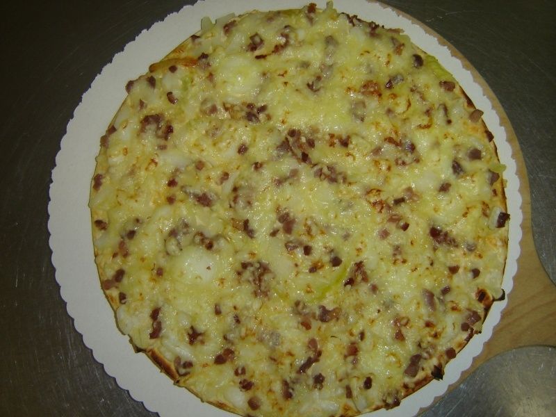 Unsere Spezialität: hausgemachter Flammkuchen